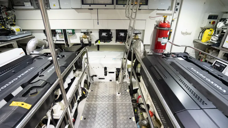 Slide: The Image of Engine room of 2022 Absolute Navetta 73 yacht with Volvo Penta engines. - 36