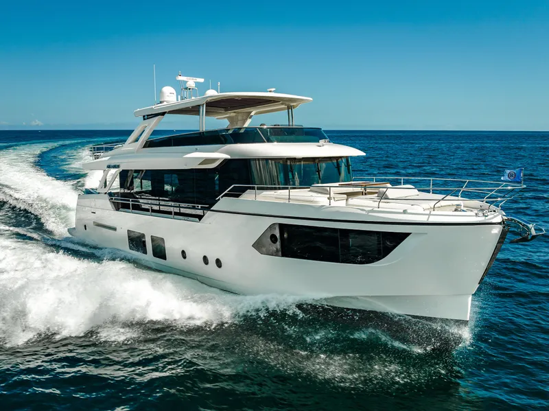 Slide: The Image of Luxury Absolute Navetta 73 yacht cruising on open sea, 2022 model. - 9