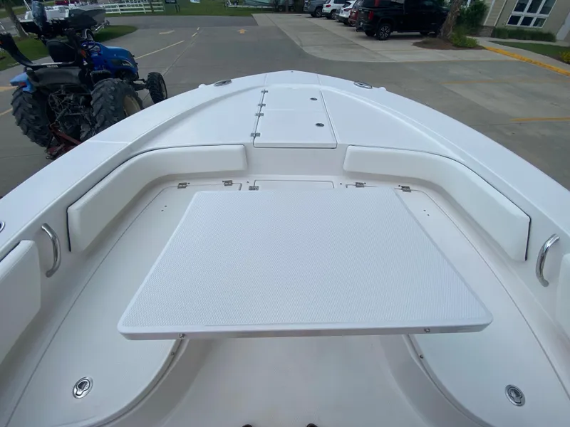 Slide: The Image of 2024 Robalo 246 Cayman boat bow seating and deck area. - 22