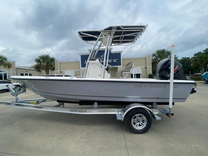 The Image of 2024 Key West 210 Bay Reef boat on trailer, parked outdoors. - 0