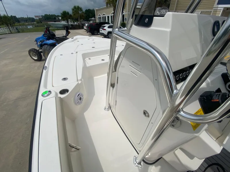 Slide: The Image of 2024 Key West 210 Bay Reef boat interior with console and seating. - 14