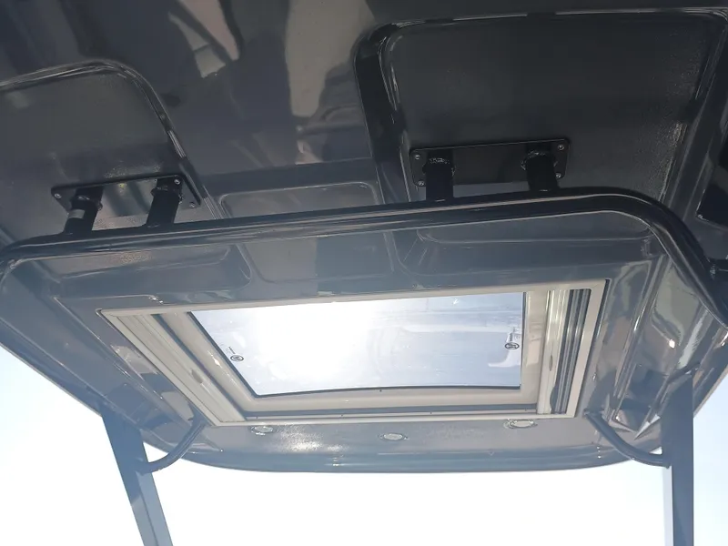 Slide: The Image of 2024 Chaparral 280 OSX boat roof with sunroof, viewed from below. - 18