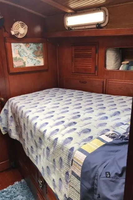 Slide: The Image of Cozy cabin interior of 1983 Stuart Marine 62 Custom Ketch with nautical decor. - 7