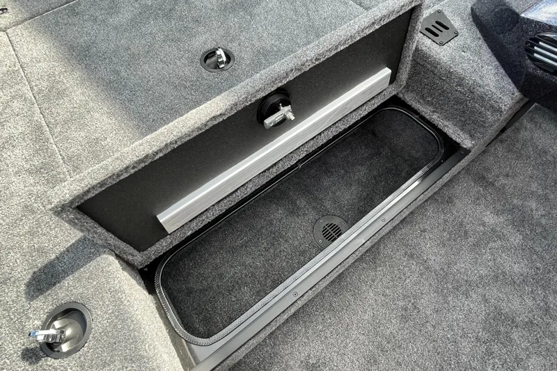 Slide: The Image of 2026 Ranger RT178 boat deck with carpeted surface and storage compartments. - 5