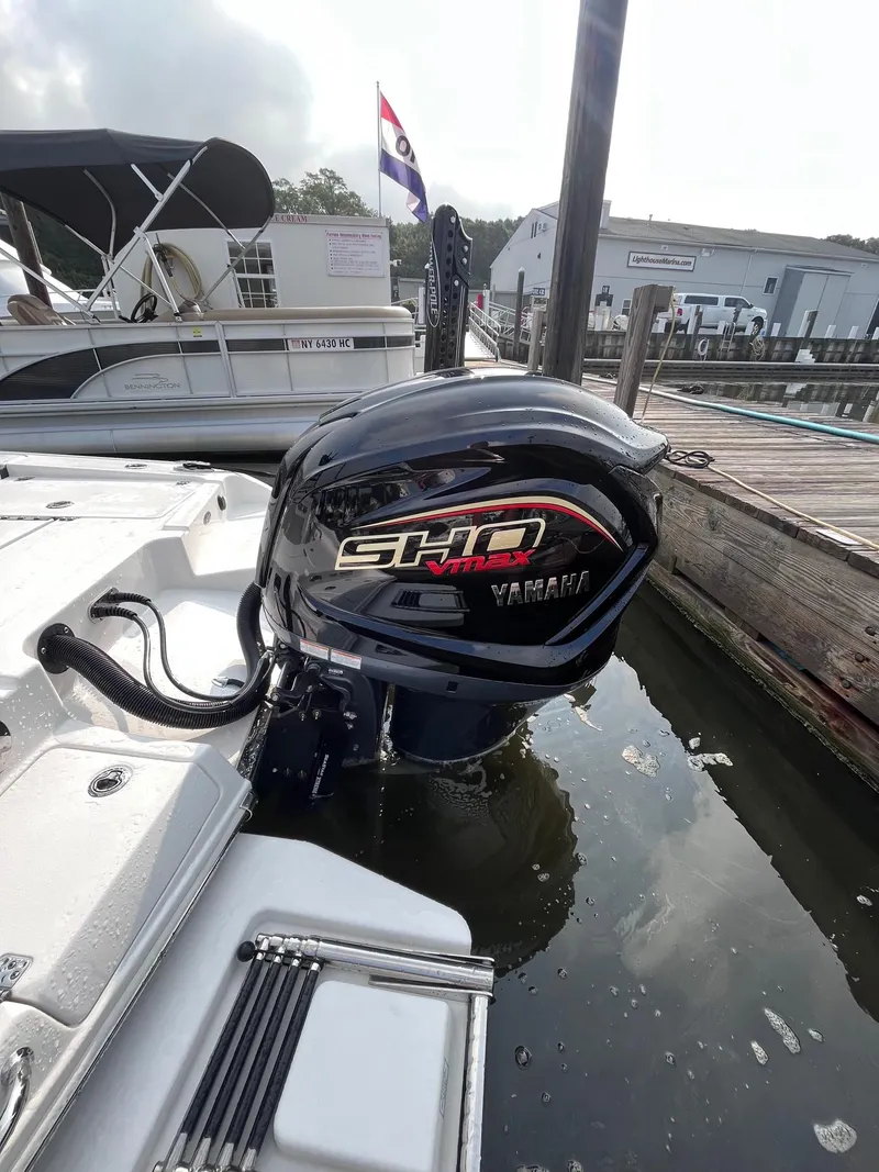 Slide: The Image of 2023 Crevalle 24 HCO boat with Yamaha SHO outboard motor at dock. - 8