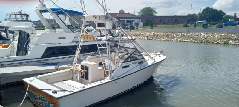 The Image of 1994 Albemarle 27sf boat docked in a marina. - 0