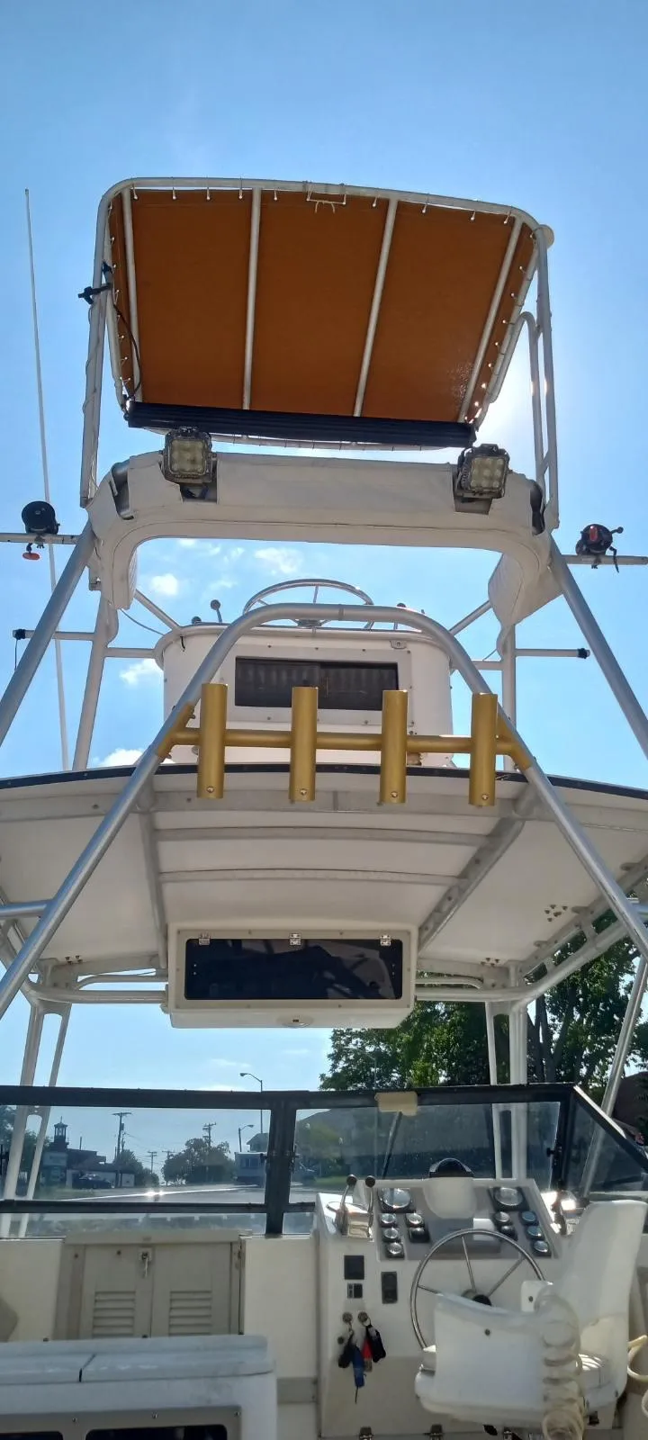 Slide: The Image of 1994 Albemarle 27sf boat with upper deck and control panel. - 16