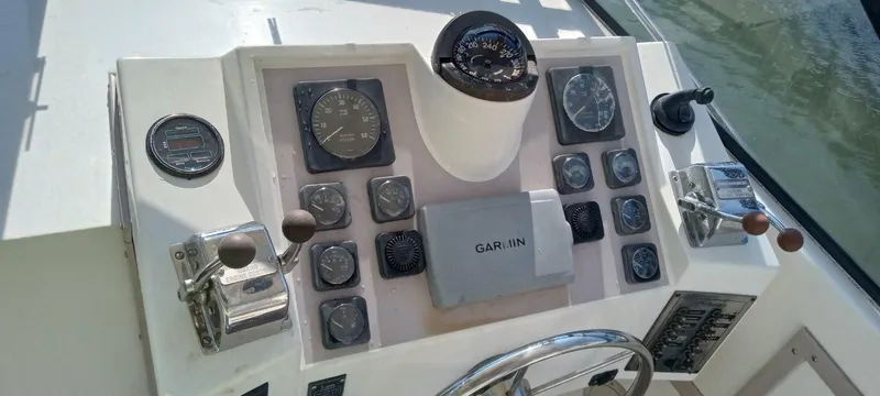 Slide: The Image of Control panel of a 1994 Albemarle 27sf boat with Garmin navigation system. - 6