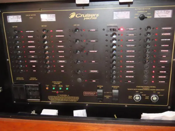 Slide: The Image of Electrical control panel of 2004 Cruisers Yachts 405 Express Motoryacht with switches and indicators. - 35