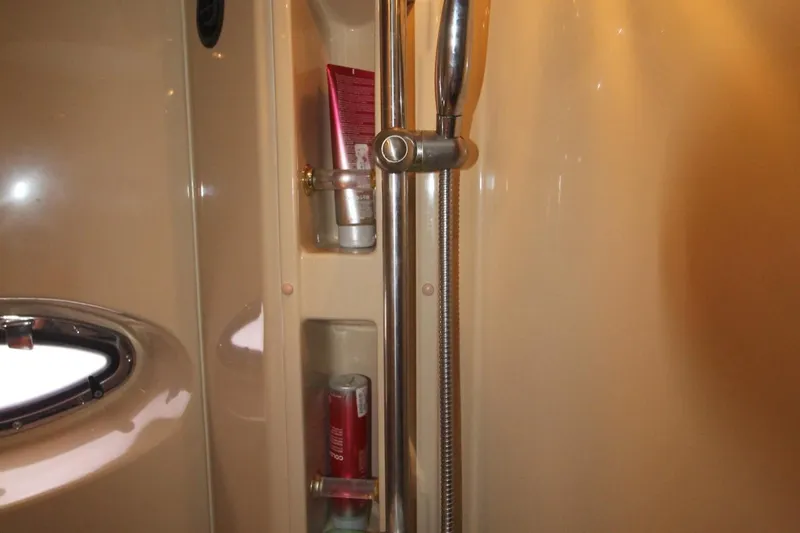 Slide: The Image of Shower area in 2004 Cruisers Yachts 405 Express Motoryacht with toiletries and chrome fixtures. - 39