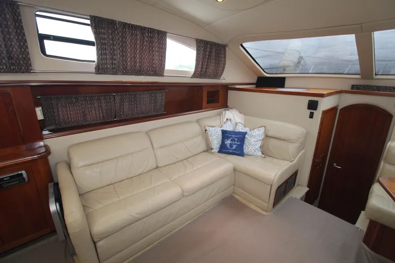 Slide: The Image of Luxurious interior of 2004 Cruisers Yachts 405 Express Motoryacht with leather seating and elegant decor. - 41