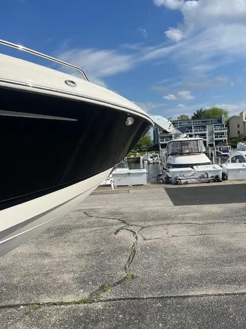 Slide: The Image of Chaparral 307 SSX 2016 boat docked at marina under blue sky. - 39