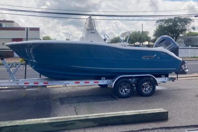 Slide: The Image of 2023 Bulls Bay 200 CC boat on trailer, parked outdoors. - 3