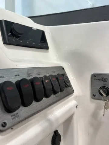 Slide: The Image of Control panel of 2024 NauticStar 203 DC boat. - 14