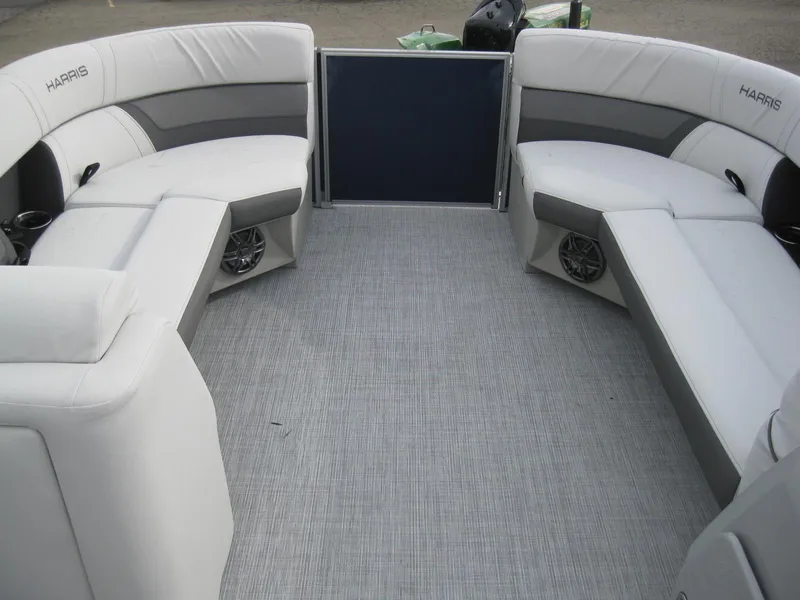 Slide: The Image of 2023 Harris FloteBote Cruiser 230 interior with spacious seating and modern design. - 14