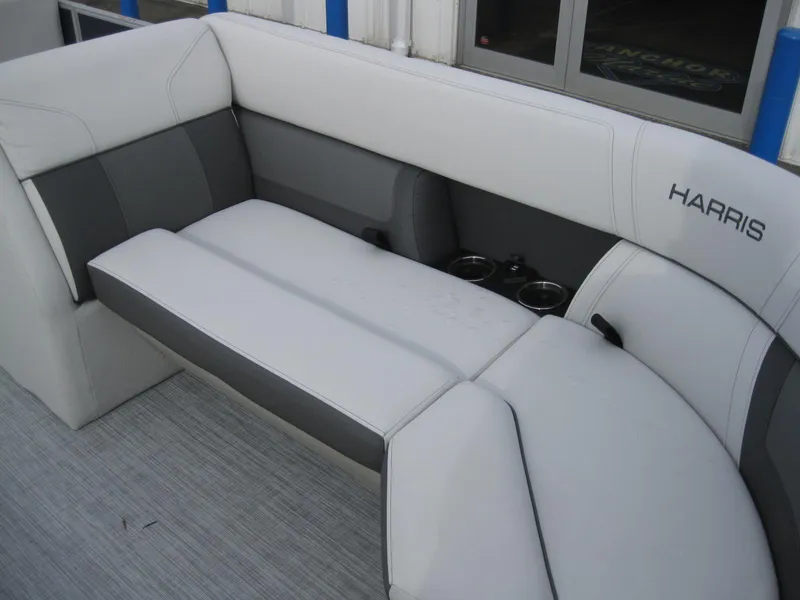 Slide: The Image of 2023 Harris FloteBote Cruiser 230 boat seating with cup holders. - 16