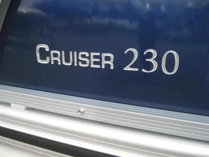 Slide: The Image of 2023 Harris FloteBote Cruiser 230 logo on blue background. - 5