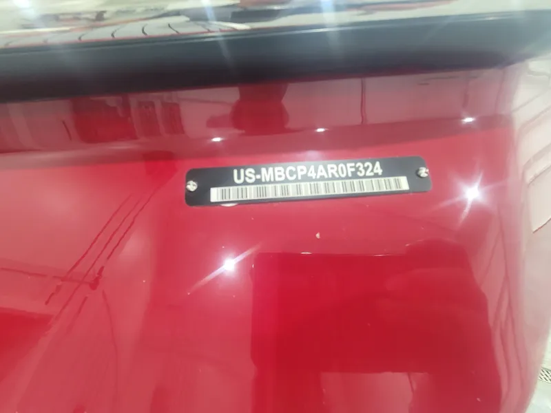 Slide: The Image of 2024 MasterCraft XT24 boat hull identification number (HIN) plate. - 23