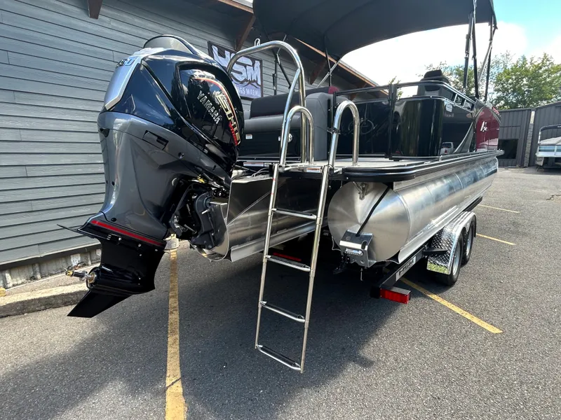 Slide: The Image of 2024 Avalon LSZ 2385 CRB pontoon boat with outboard motor and ladder. - 8