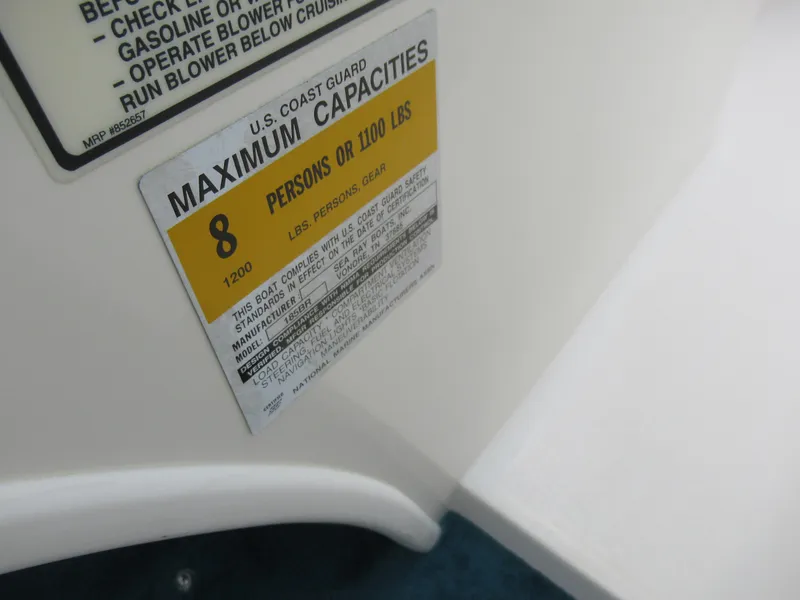 Slide: The Image of 1997 Sea Ray 185 Bow Rider maximum capacity label, 8 persons or 1200 lbs. - 13