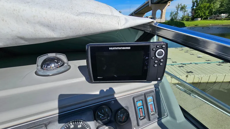 Slide: The Image of Humminbird fish finder on the dashboard of a 1988 Formula 26 PC boat. - 12
