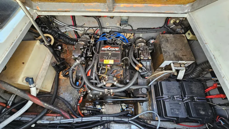 Slide: The Image of 1988 Formula 26 PC engine compartment with MerCruiser 7.4L engine. - 24