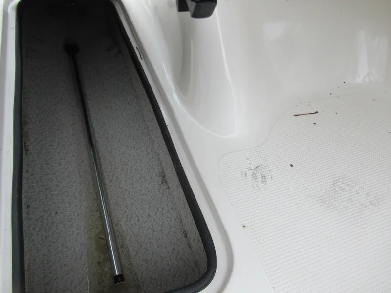 Slide: The Image of 2004 Sugar Sand Tango Xtreme boat interior storage compartment. - 11