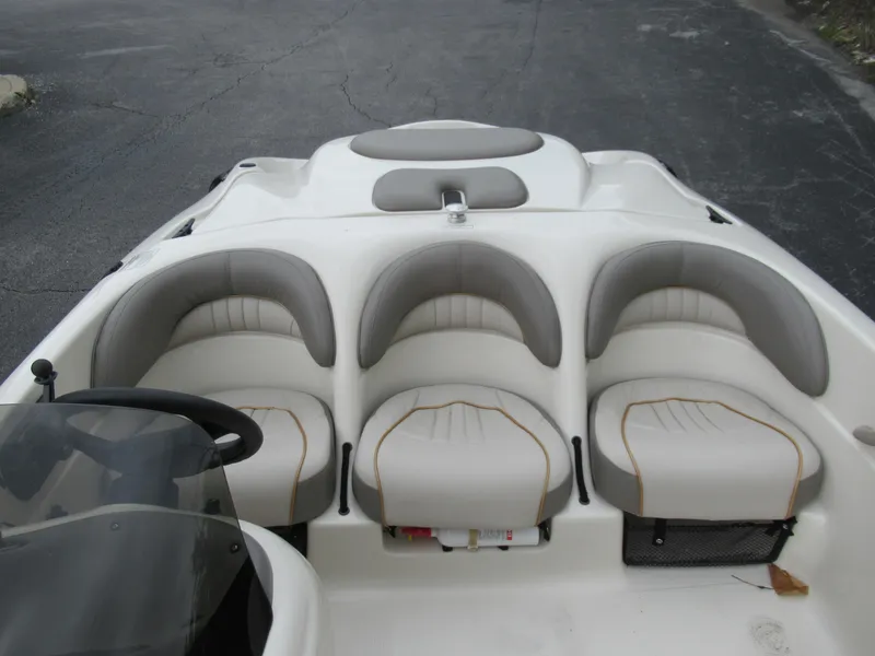 Slide: The Image of 2004 Sugar Sand Tango Xtreme boat interior with three seats. - 15