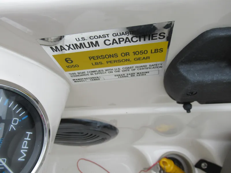 Slide: The Image of 2004 Sugar Sand Tango Xtreme boat capacity label, 6 persons or 1050 lbs. - 17