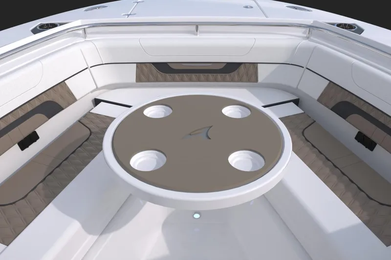 Slide: The Image of 2024 Blackfin 252DC boat interior with round table and seating area. - 18