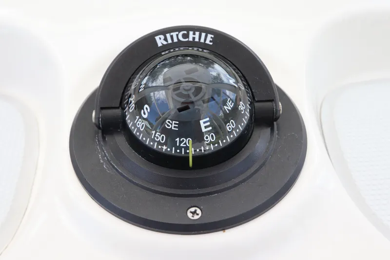 Slide: The Image of Ritchie compass on 2021 Robalo 246 Cayman SD boat. - 26