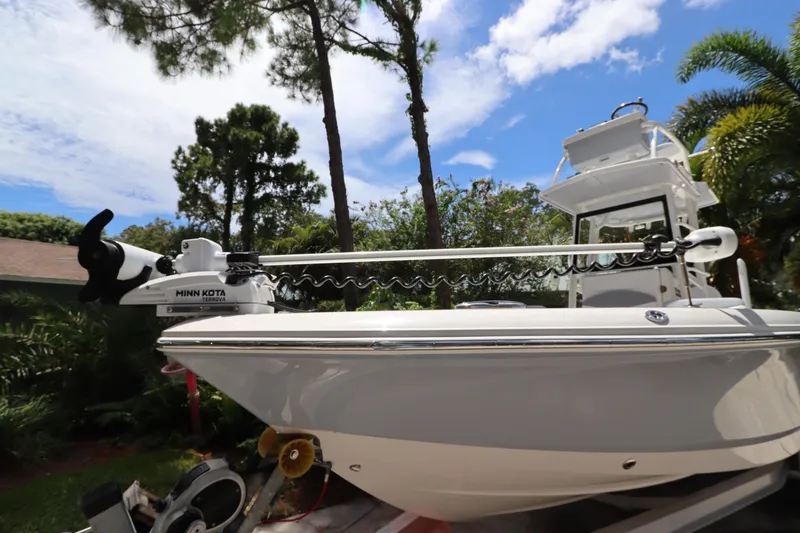 Slide: The Image of 2021 Robalo 246 Cayman SD boat with Minn Kota trolling motor. - 38