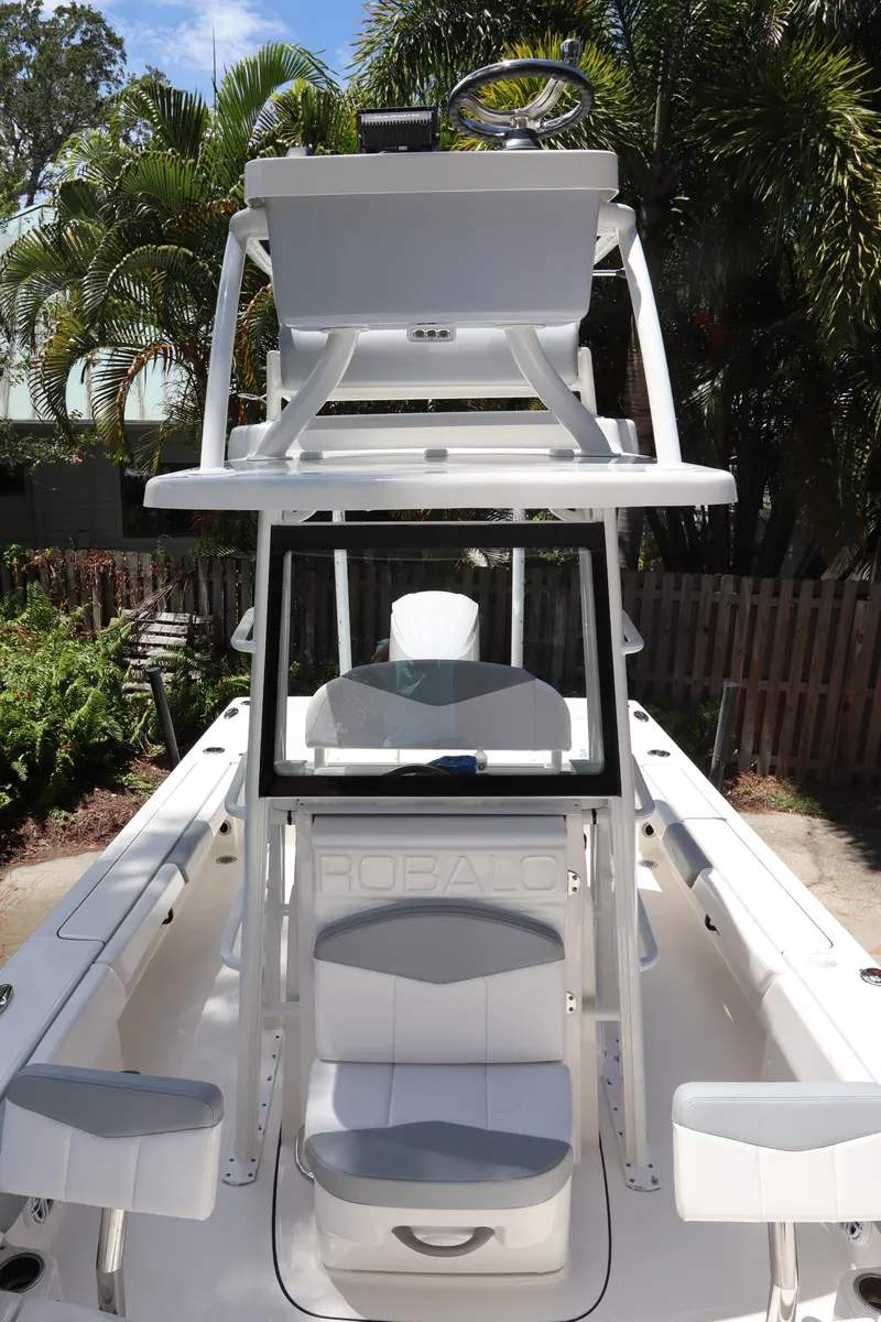 Slide: The Image of 2021 Robalo 246 Cayman SD center console boat with dual seating and T-top. - 42