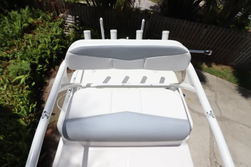 Slide: The Image of 2021 Robalo 246 Cayman SD boat seating and rod holders. - 46