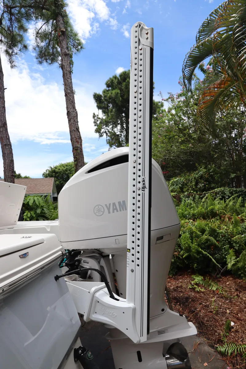 Slide: The Image of 2021 Robalo 246 Cayman SD boat with Yamaha outboard motor. - 7