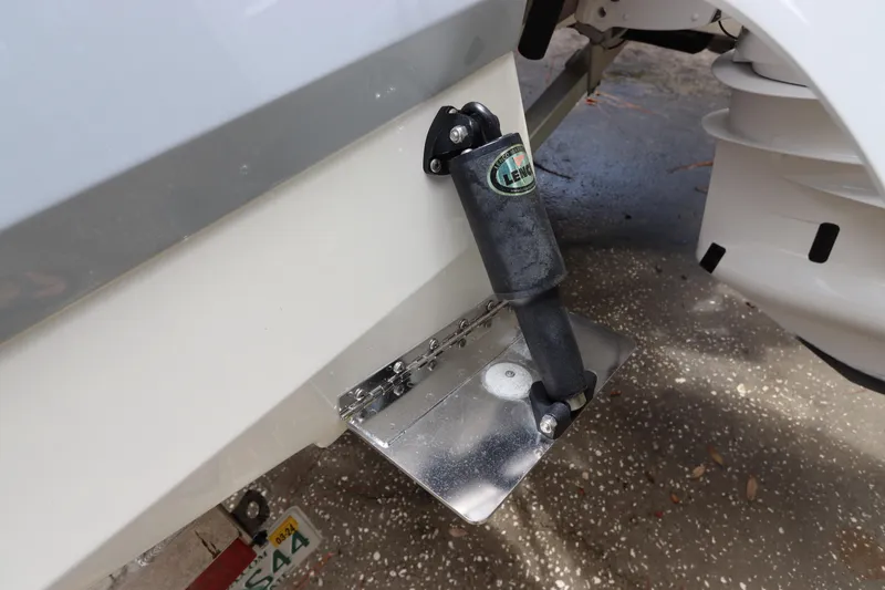 Slide: The Image of 2021 Robalo 246 Cayman SD trim tab detail. - 8