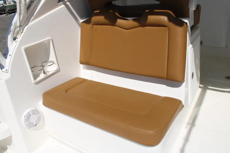Slide: The Image of 2021 Albemarle 30 Express boat with tan leather seating and built-in cup holders. - 18