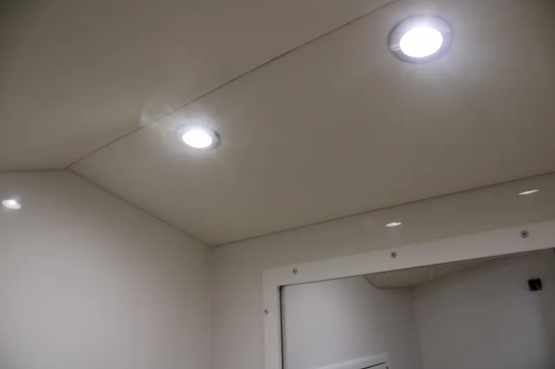 Slide: The Image of Ceiling lights inside 2021 Albemarle 30 Express boat cabin. - 32