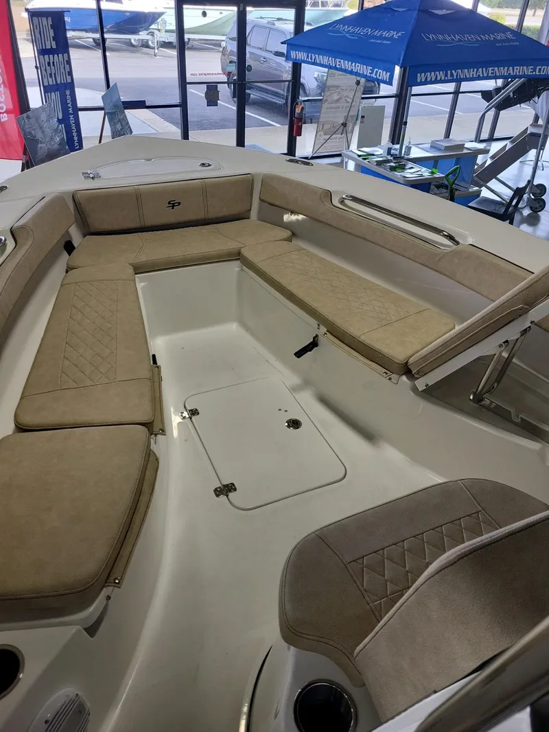 Slide: The Image of 2024 Sea Pro 199 Center Console boat interior with cushioned seating. - 4