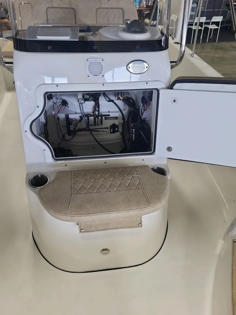 Slide: The Image of 2024 Sea Pro 199 Center Console boat with open storage compartment. - 9