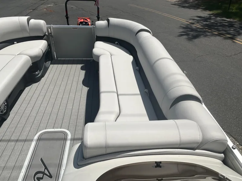 Slide: The Image of 2023 Avalon 2785 ENT FS pontoon boat with spacious seating and modern design. - 15
