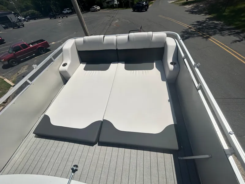 Slide: The Image of 2023 Avalon 2785 ENT FS boat with spacious sunbathing lounge area. - 29