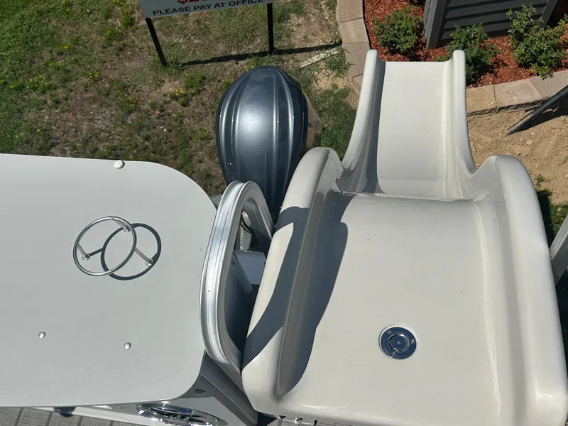 Slide: The Image of 2023 Avalon 2785 ENT FS boat with slide and motor. - 33