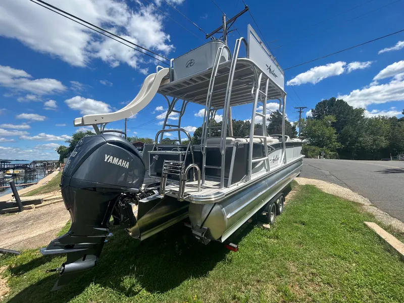 Slide: The Image of 2023 Avalon 2785 ENT FS pontoon boat with Yamaha outboard motor and slide. - 7