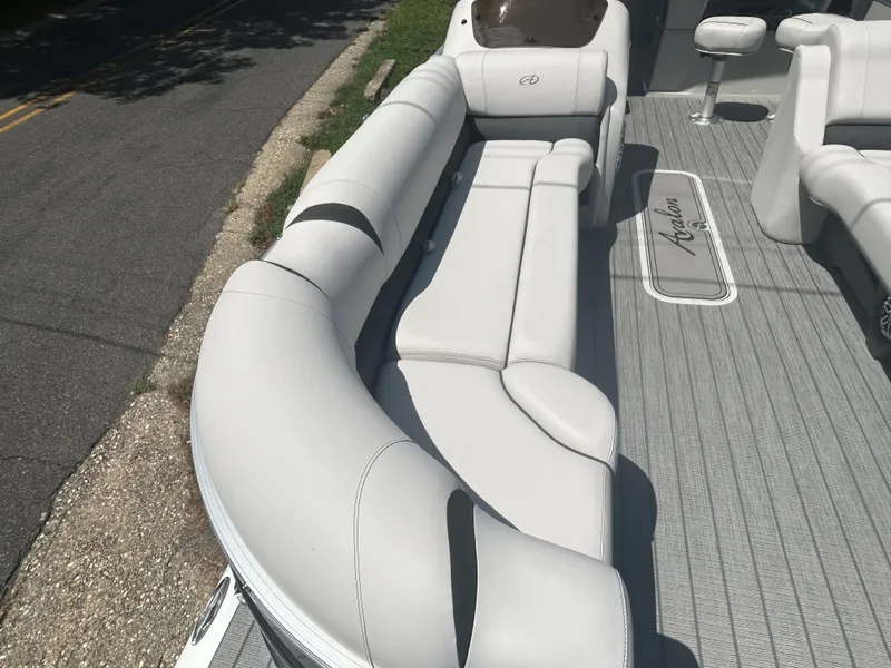 Slide: The Image of 2023 Avalon 2785 ENT FS boat with luxurious seating and modern design. - 9
