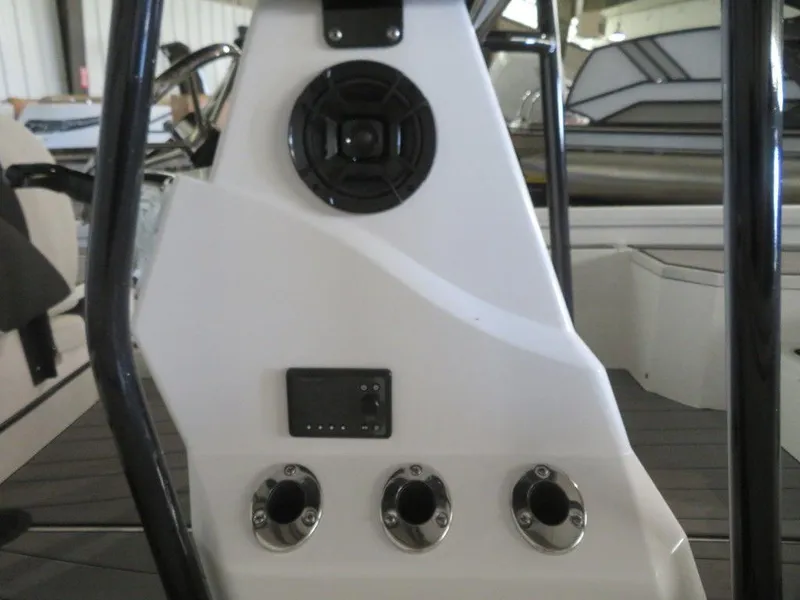 Slide: The Image of 2024 Vexus AVX2180CC boat console with speaker and control panel. - 12