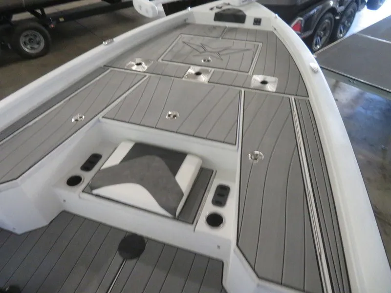 Slide: The Image of 2024 Vexus AVX2180CC boat deck with storage compartments and seating. - 14