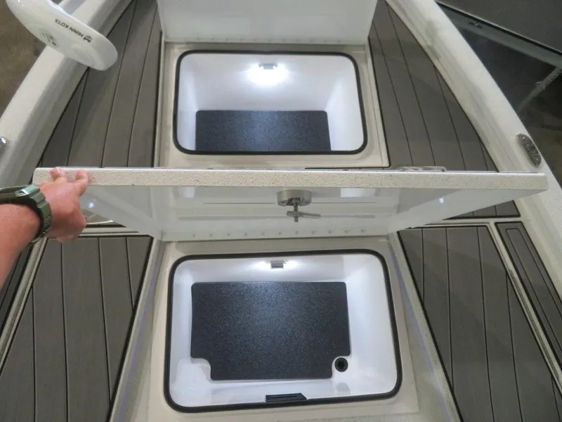 Slide: The Image of 2024 Vexus AVX2180CC boat storage compartments with LED lighting. - 20