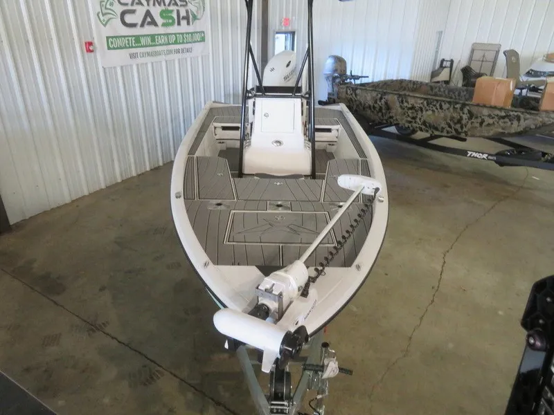 Slide: The Image of 2024 Vexus AVX2180CC boat in a showroom, front view. - 4
