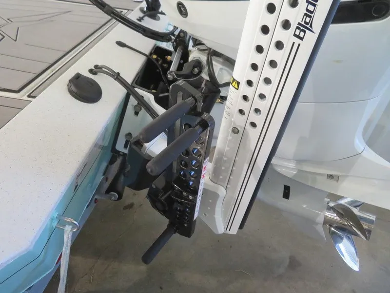 Slide: The Image of 2024 Vexus AVX2180CC boat with motor and accessories in close-up view. - 9